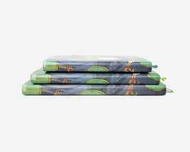 Stack of three patterned 2026-2027 planners on a white background