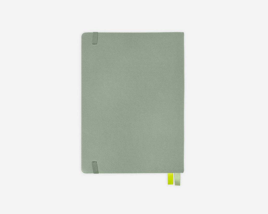 Green planner cover on a white background