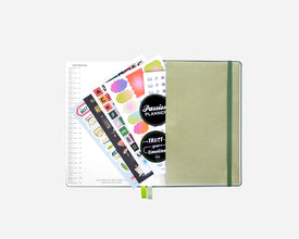 Green planner back pocket with free stickers on a white background