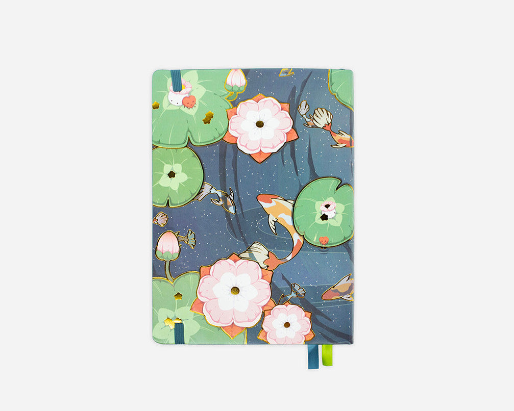 Weekly planner with a koi pond design on a blue background with gold foiling