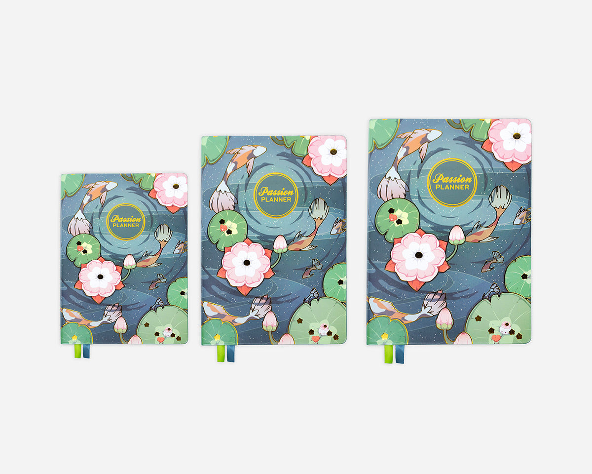 Three different sized planners with floral and nature-themed design on a white background