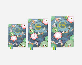 Three different sized planners with floral and nature-themed design on a white background