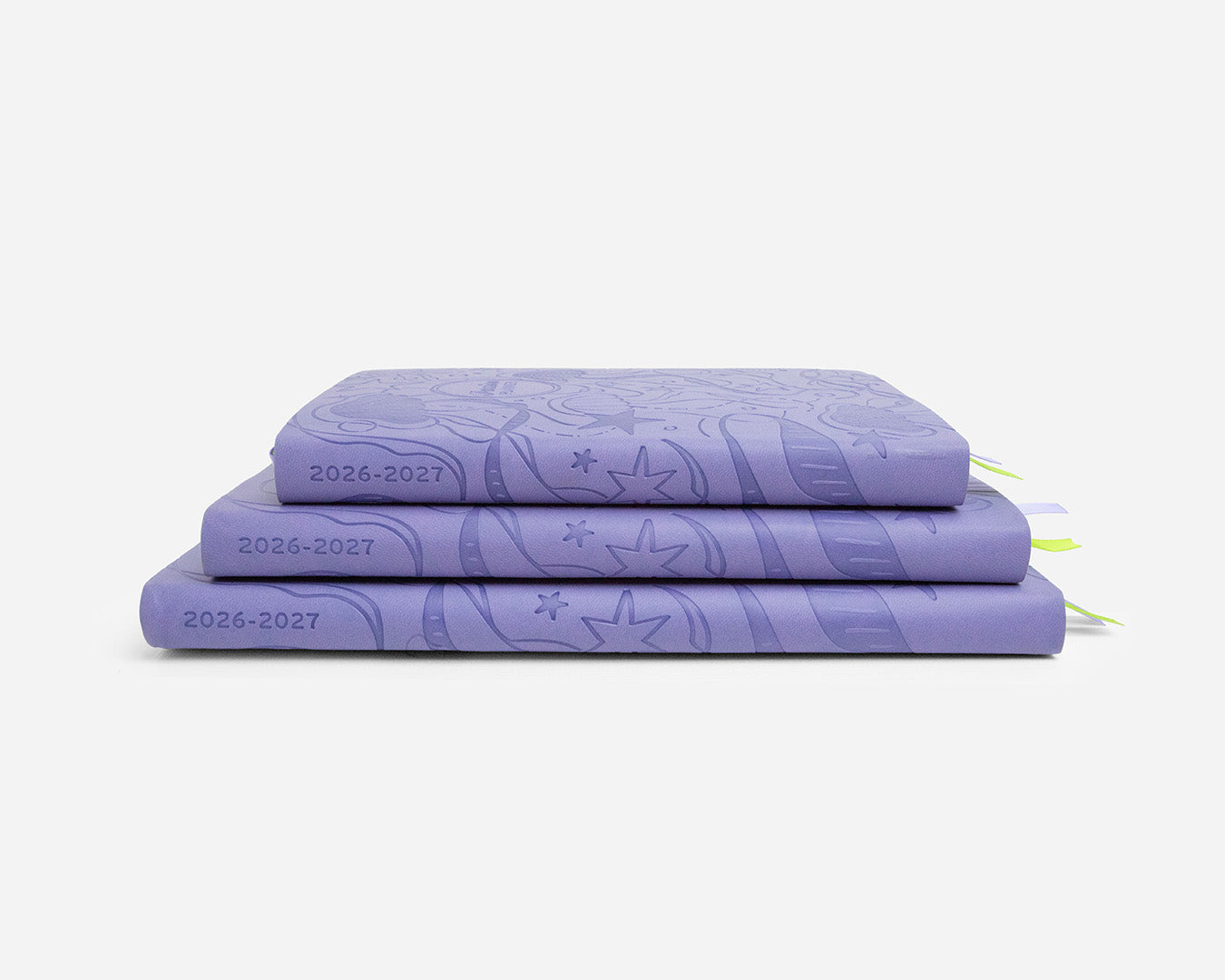 Three periwinkle planners with 2026-2027 on the spines stacked on a white background