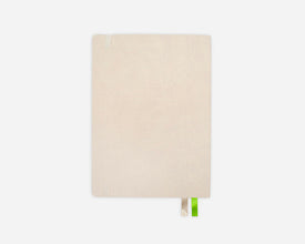 Cream colored mid-ear planner with a green ribbon on a white background.