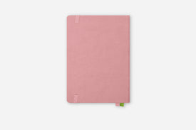 Pink notebook on a white background