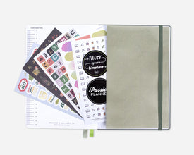 Green planer back pocket with stickers and accessories on a white background