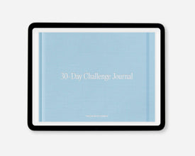A 30-Day Challenge Journal by Passion Planner, featuring a light blue textured cover with white text, within a black tablet screen, shown on a light gray background.