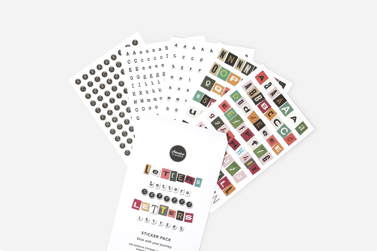 Five sticker sheets with different letter designs on a white background