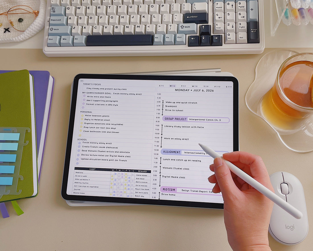 Person using a digital planner with a to-do list on a desk with a keyboard, notebook, and tea.